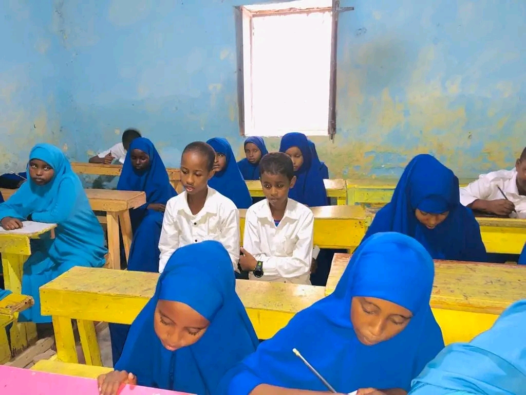 Middle school students learning in class