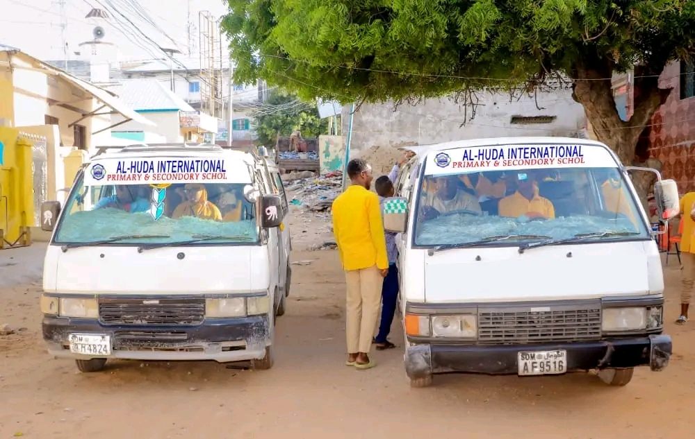 Al-Hudda school transport vans serving students